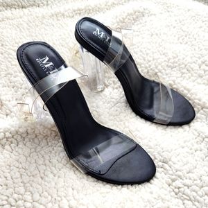 Brand new. Size 7.5 Clear Strappy Heels